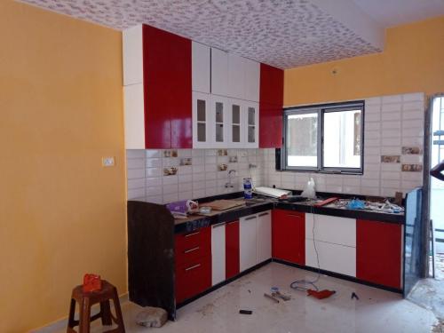 RED AND WHITE LAMINATE KITCHEN